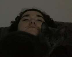 He has a pet cat.